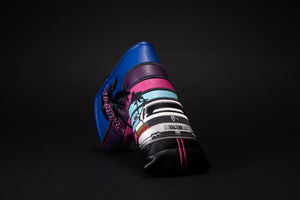 Miami 80s retro golf putter blade headcover showing a white Italian sports car with two doors going down the black paved road towards the sunset in Miami Beach Florida with palm trees made by Valtno a luxury golf cover